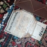 Vintage oriental rug from the 1930s. Handcrafted, handmade. Worn.