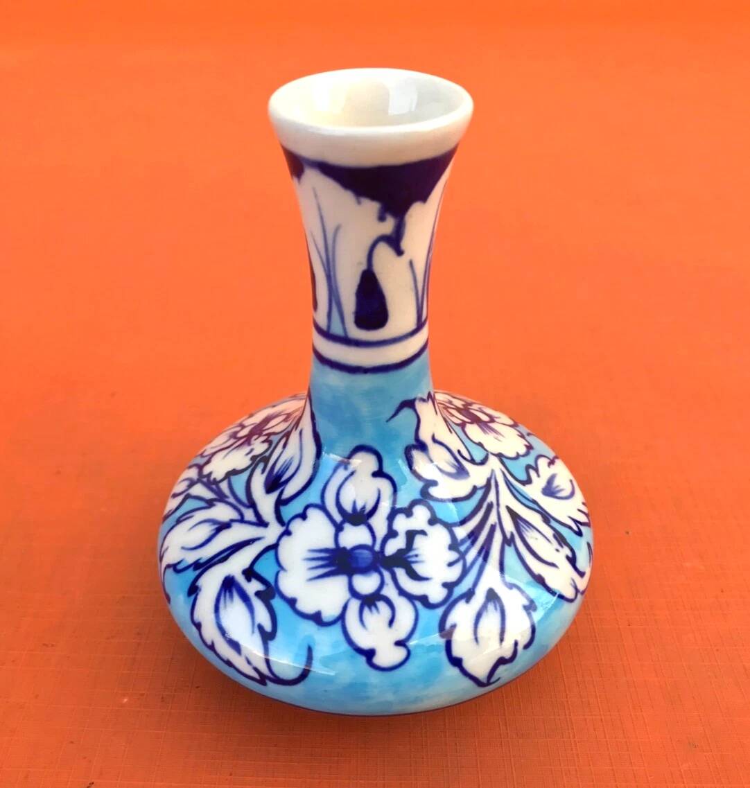 Ceramic vase with floral decoration Height: 100mm Diameter (at the neck): 30mm In