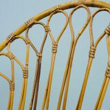 A pair of rattan chairs