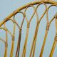 A pair of rattan chairs