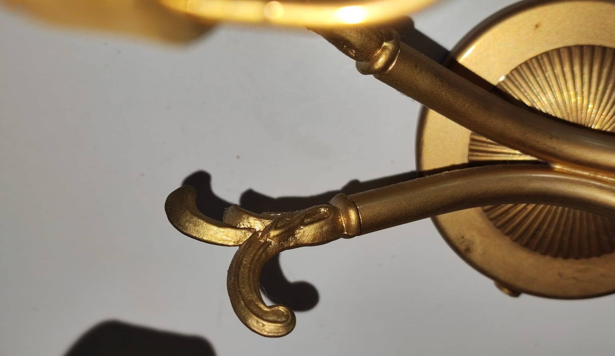 Antique brass wall sconce with two arms, Louis XV style.