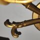 Antique brass wall sconce with two arms, Louis XV style.