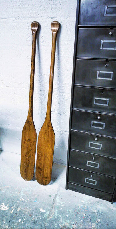 Pair of old wooden oars