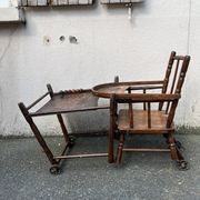 Wooden baby high chair convertible into a small desk from the 1950s