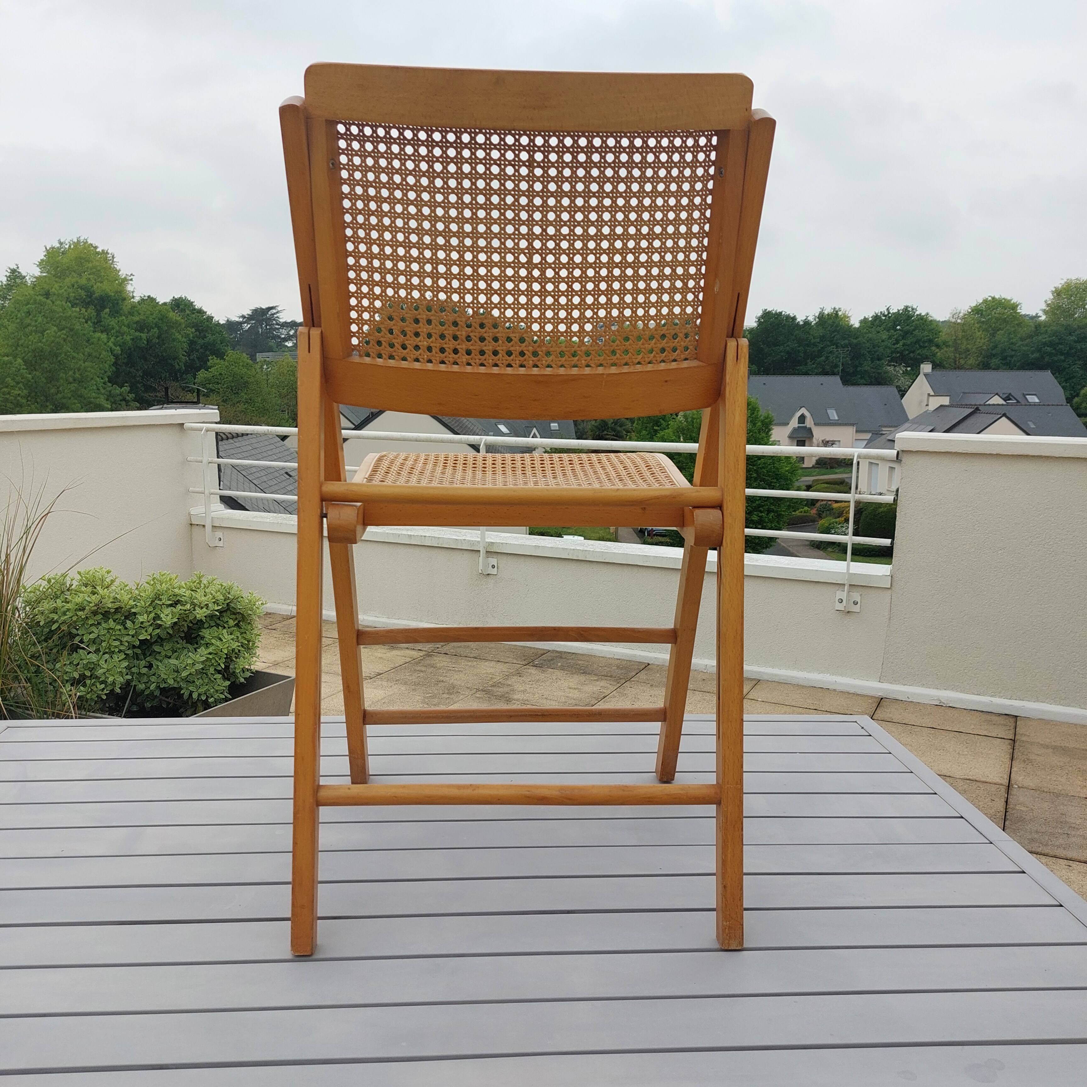 Vintage woven cane folding chair from the 80s