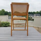 Vintage woven cane folding chair from the 80s