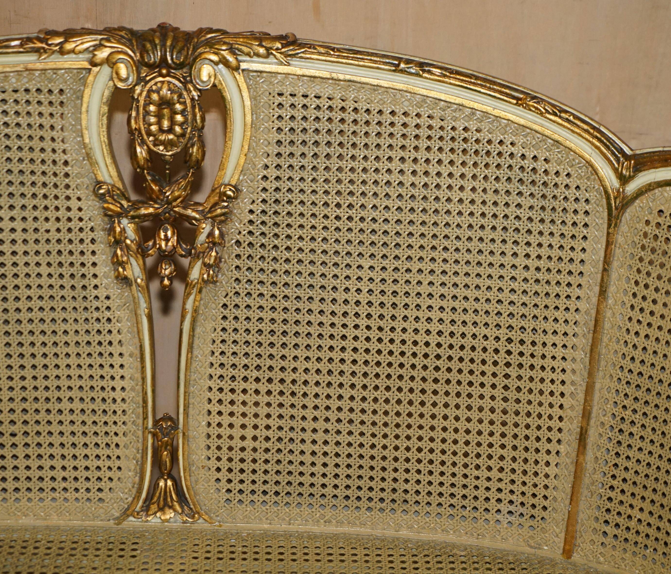 Louis XVI Bergère canapé in gilded wood with double caning
