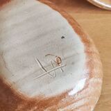 Glazed stoneware bowls for aperitifs or as catchalls in the shape of a walnut, signed.