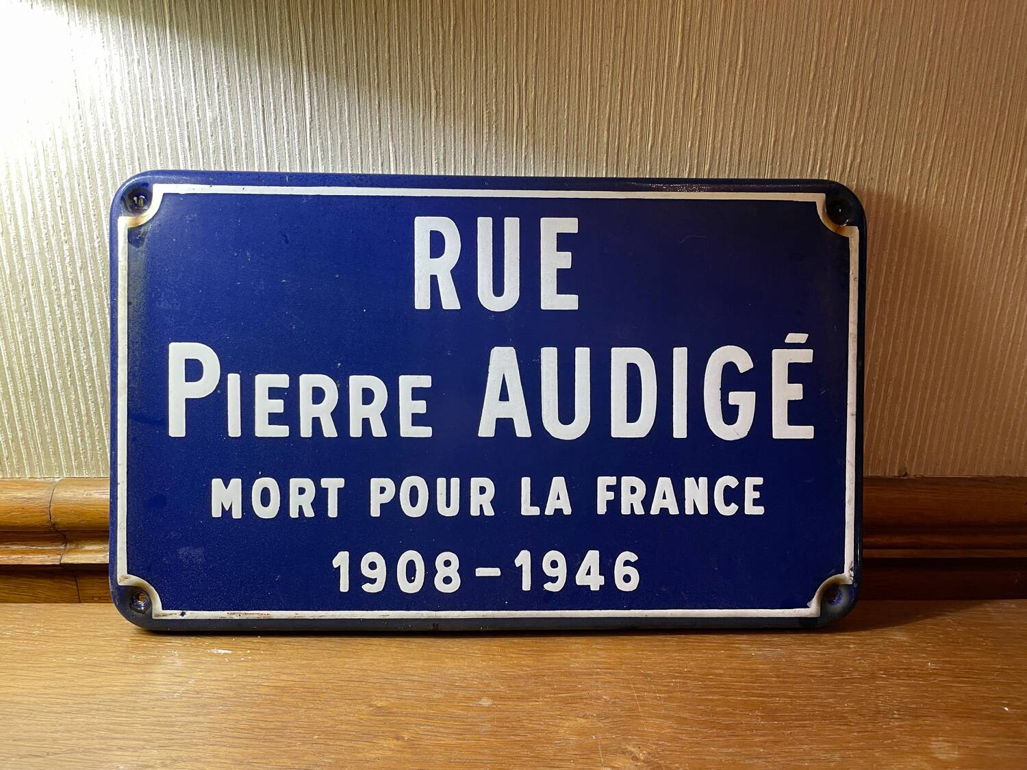 Enameled sheet metal street sign