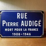 Enameled sheet metal street sign