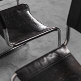 Set of 4 chairs in black leather 70s vintage