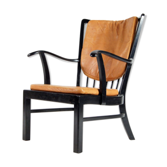 Fauteuil Fritz Hansen en cuir années 70