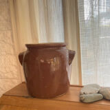 Ancient ceramic salt cellar and its lid.
