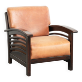 Fauteuil en cuir de vache couleur cognac au design Art Déco luxueux