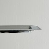 Small rectangular tray made of lightweight metal.