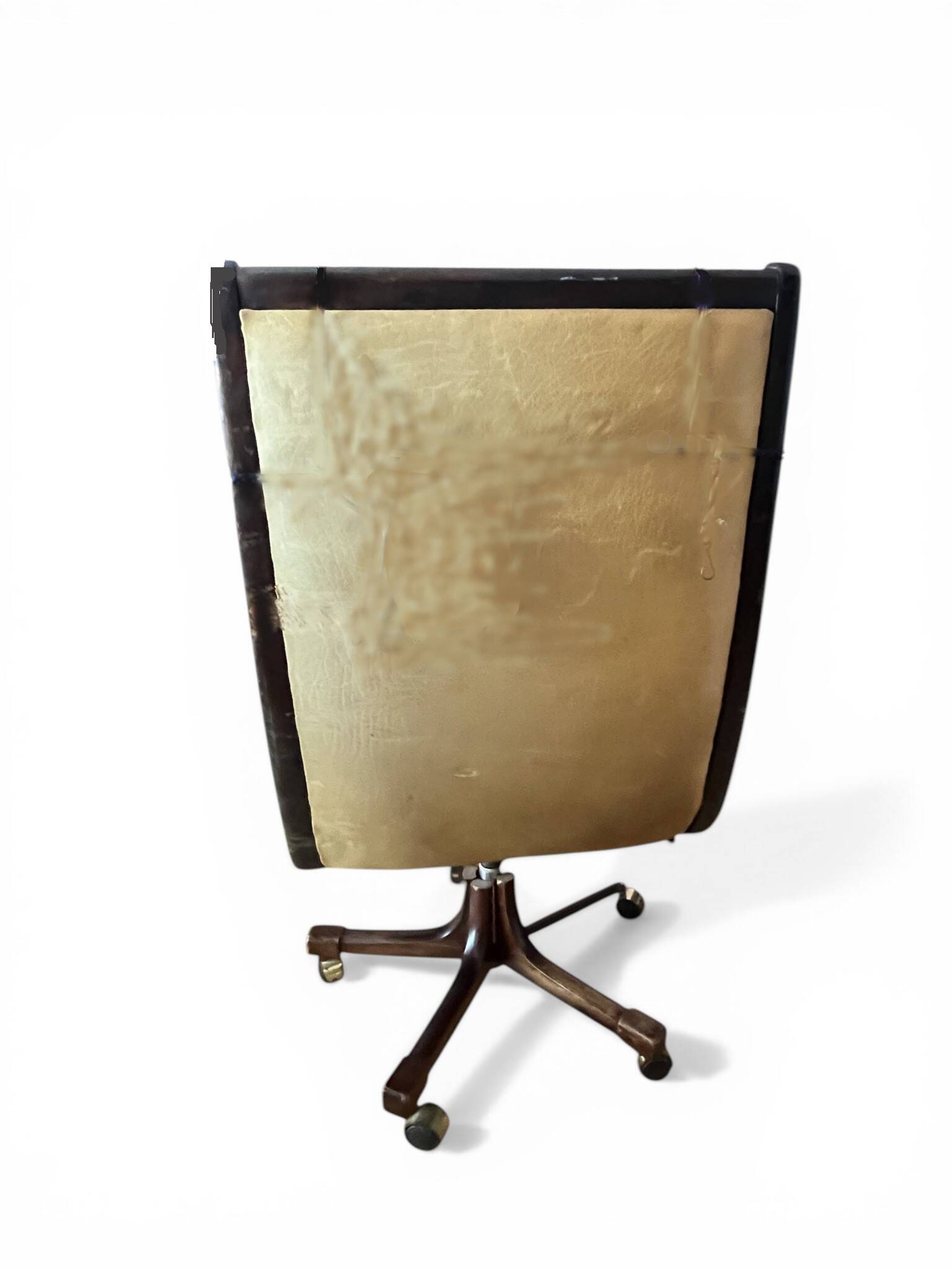 Vintage mahogany and havana leather office chair with wheels from around 1970.