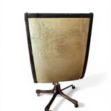 Vintage mahogany and havana leather office chair with wheels from around 1970.