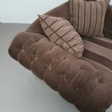 Large weighty love seat with the original matching cushions. Marked "Handmade in Holland"