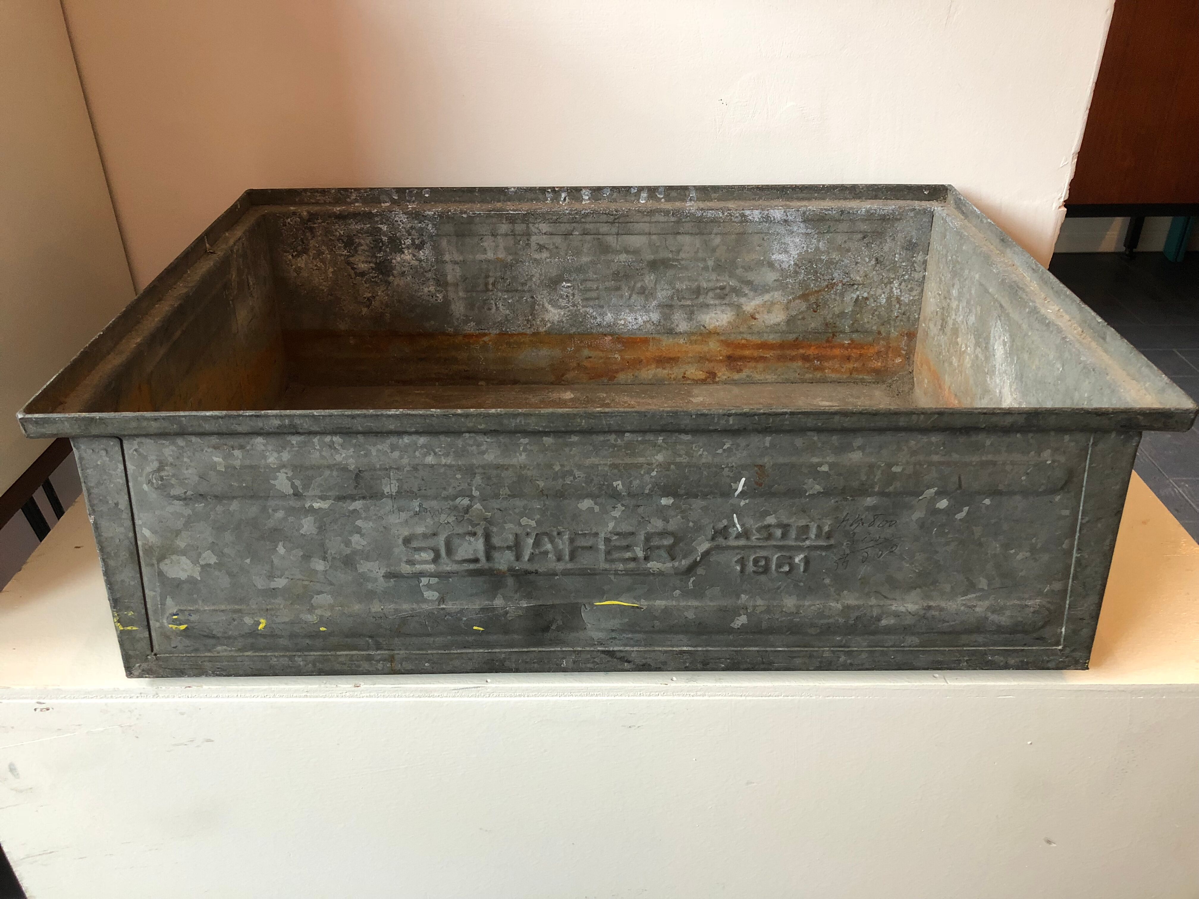 Old galvanized metal locker basket