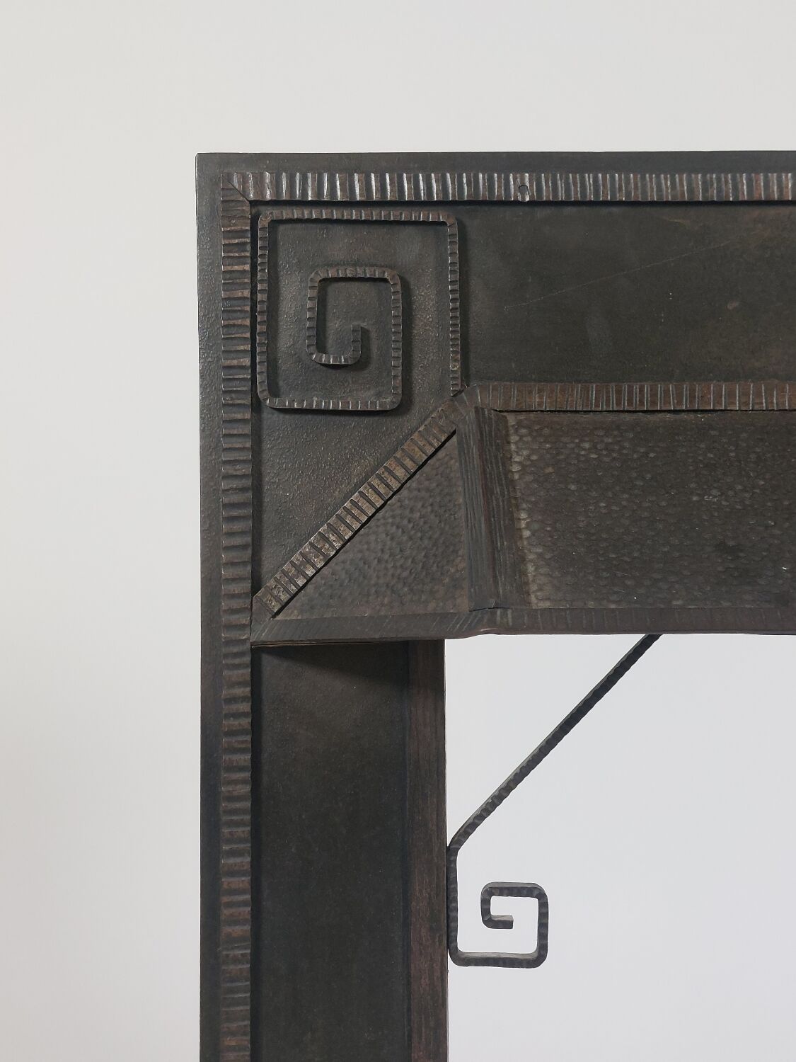 Hand-forged spiral decorative fire surround.