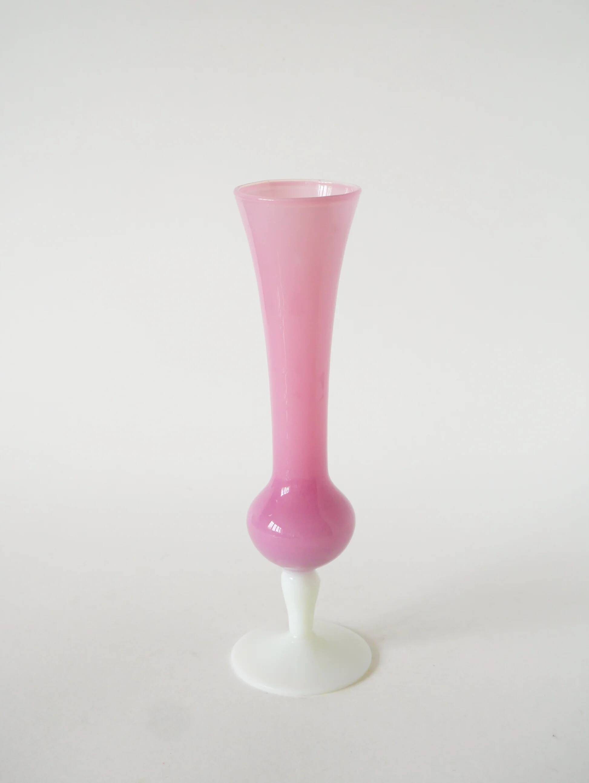 Single flower vase in opaline, pink with white feet, 1970.