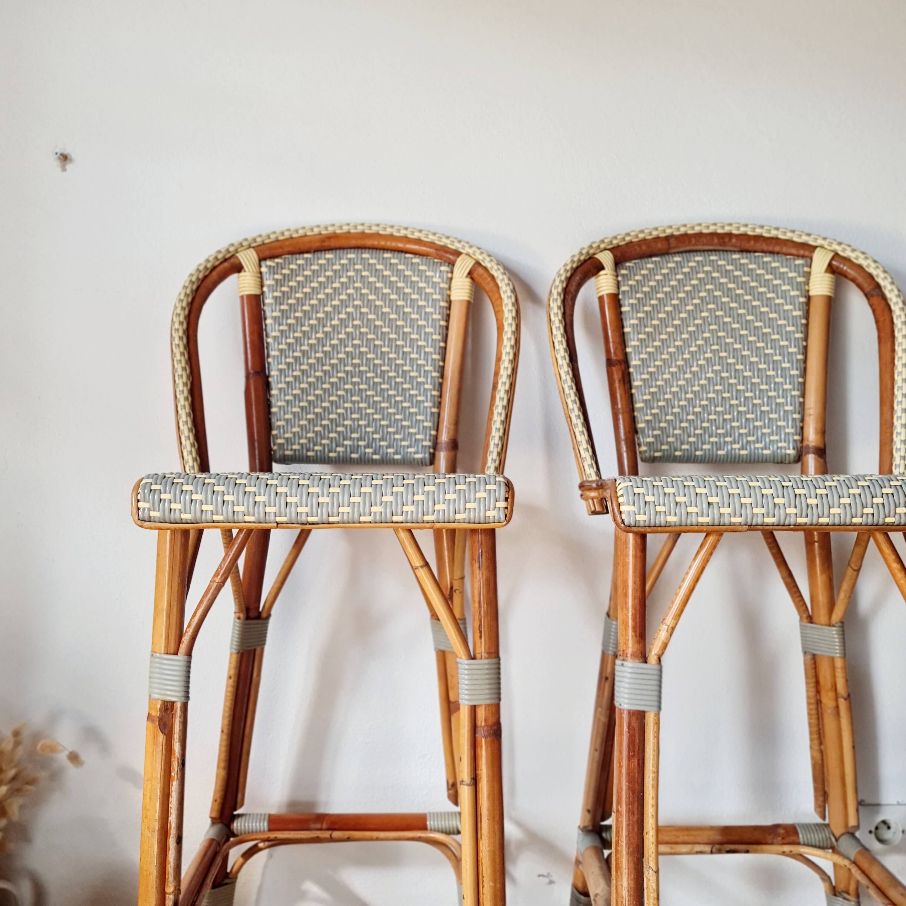 Pair of vintage Gatti bar stools in two-tone rattan and caning.