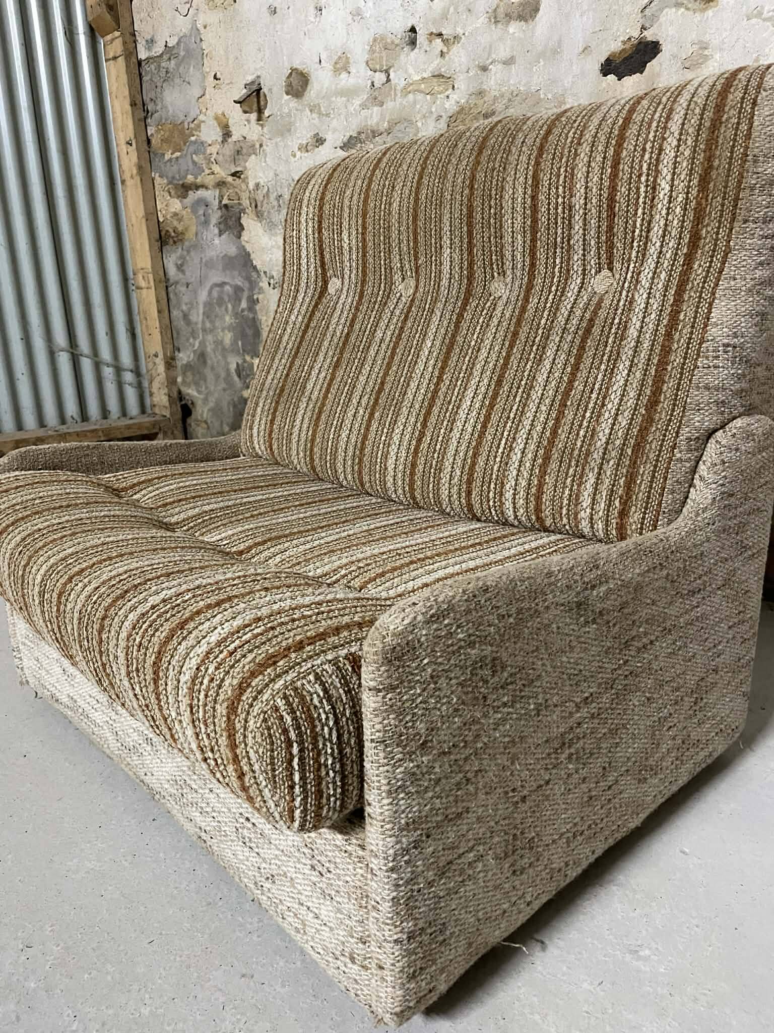 Vintage convertible armchair into a guest bed.