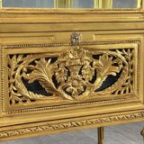 Carved and gilded wooden display cabinet, Louis XVI style, 20th century.