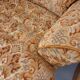 Set of 2 vintage armchairs in floral fabric with fringes from the 60s 70s