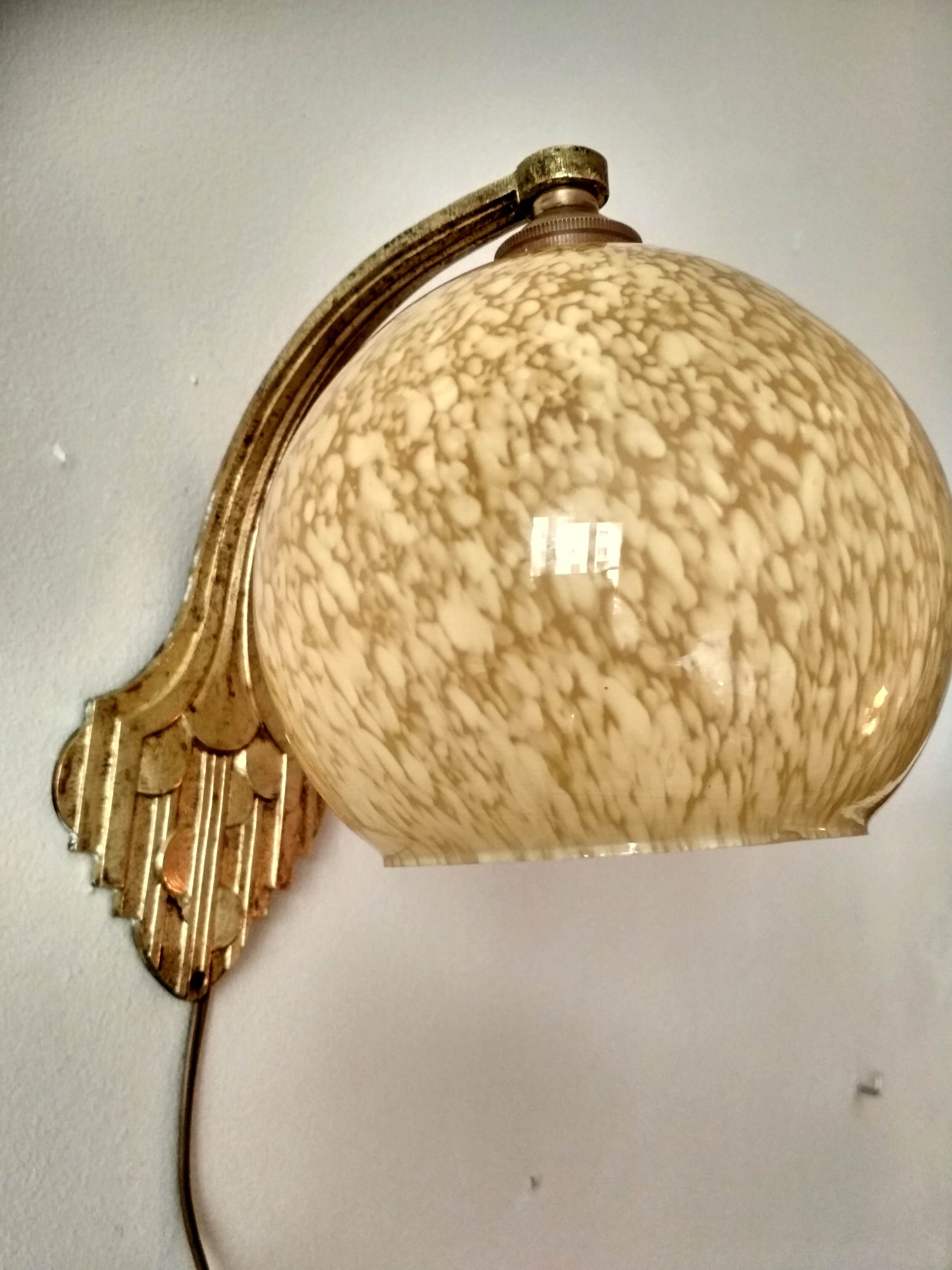 Art deco sconce, golden brass and yellow speckled Clichy glass globe