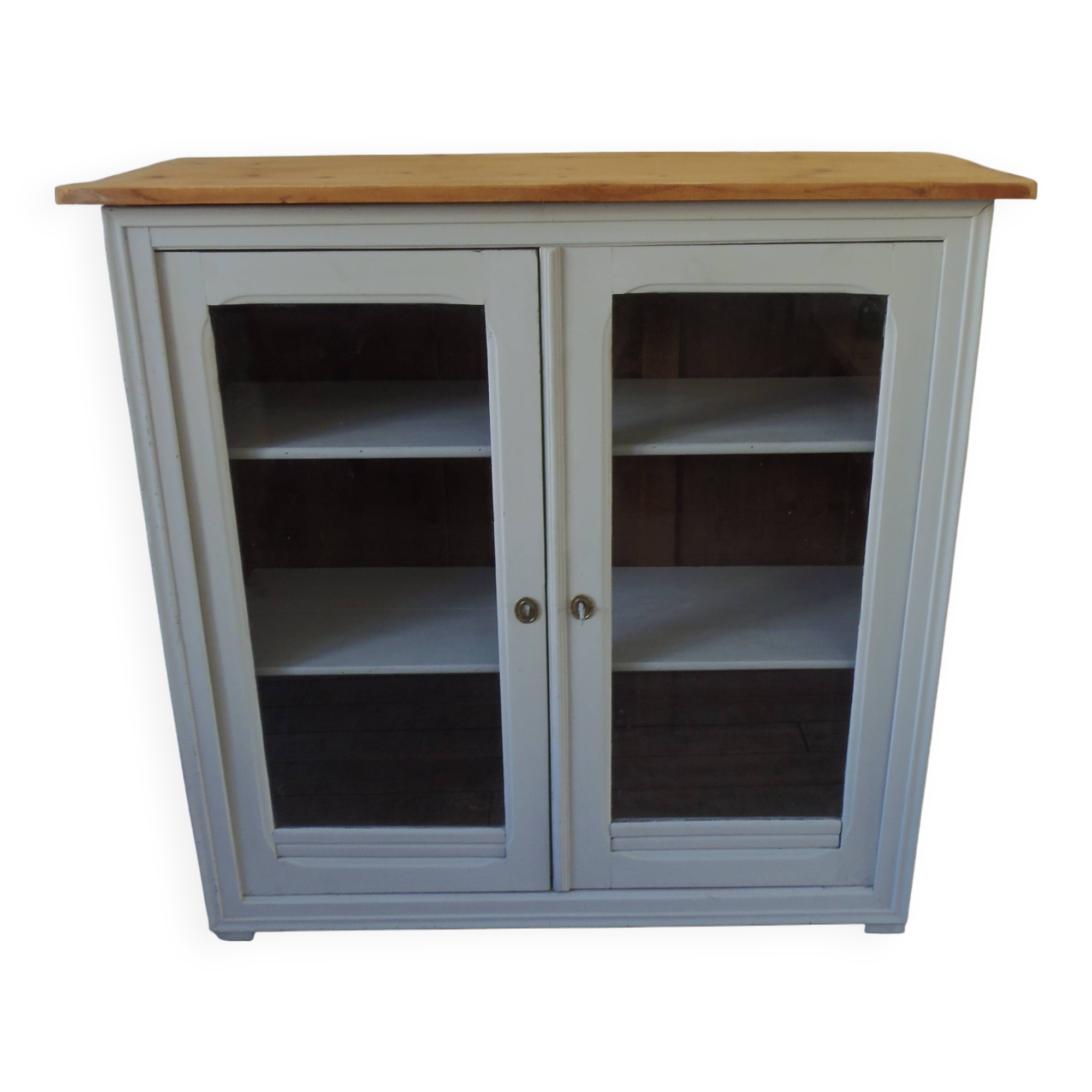 Display case, old shallow sideboard re-enchanted in cloud gray.