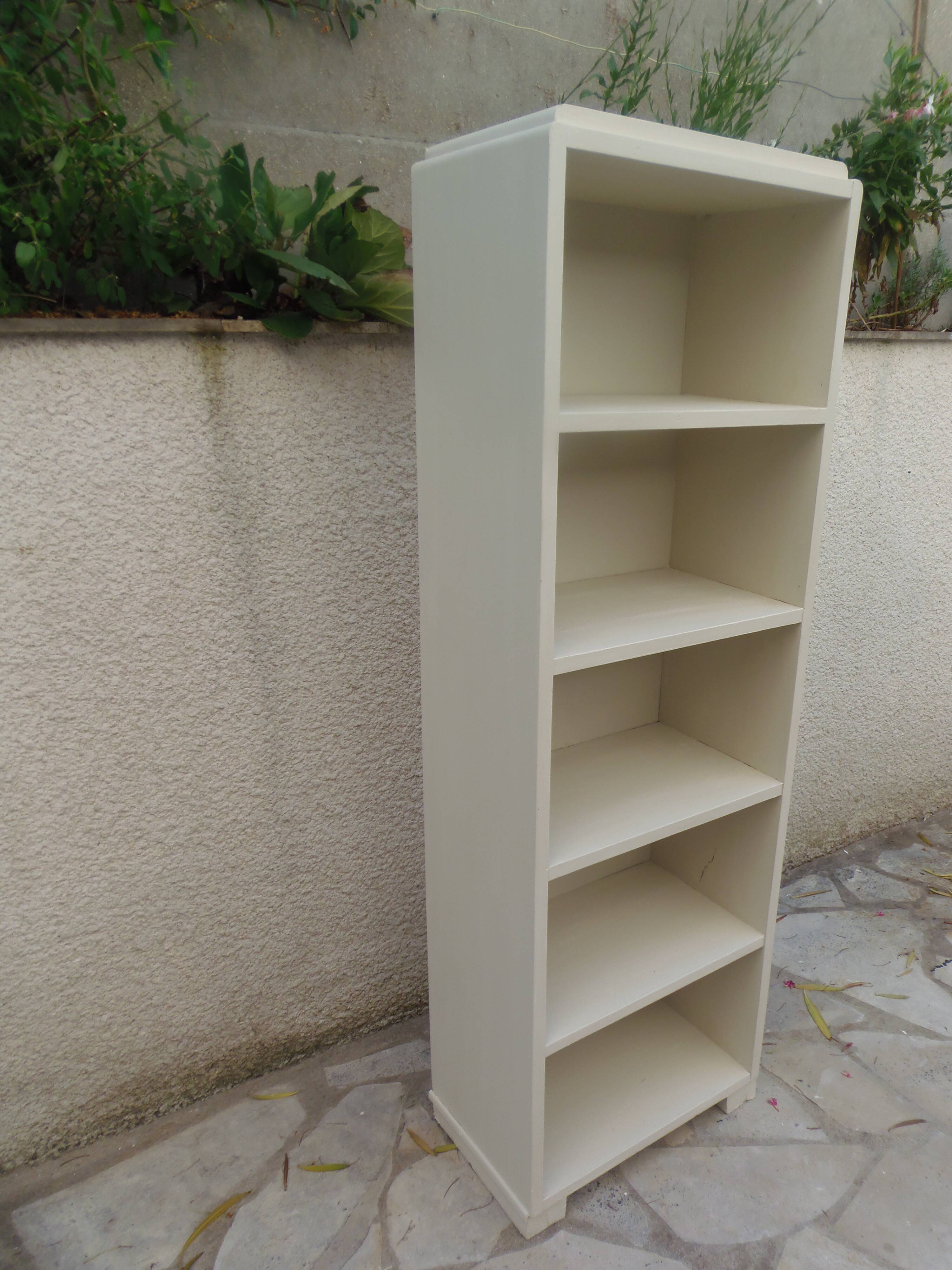 Renovated vintage 1950s library in beige.