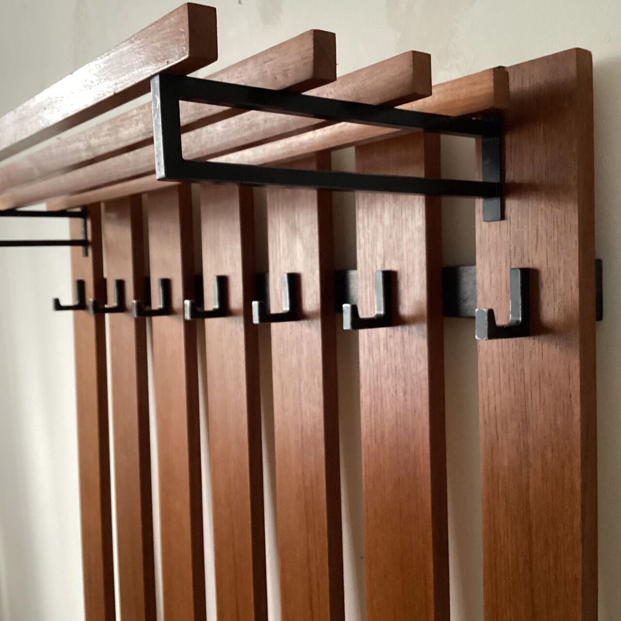 Wooden wall coat rack