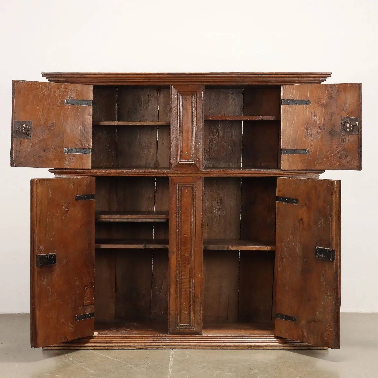 Antique double-bodied buffet, early 17th century, walnut doors.