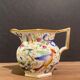Pot à lait en porcelaine Vieux Paris à décor floral à l'oiseau polychrome et or