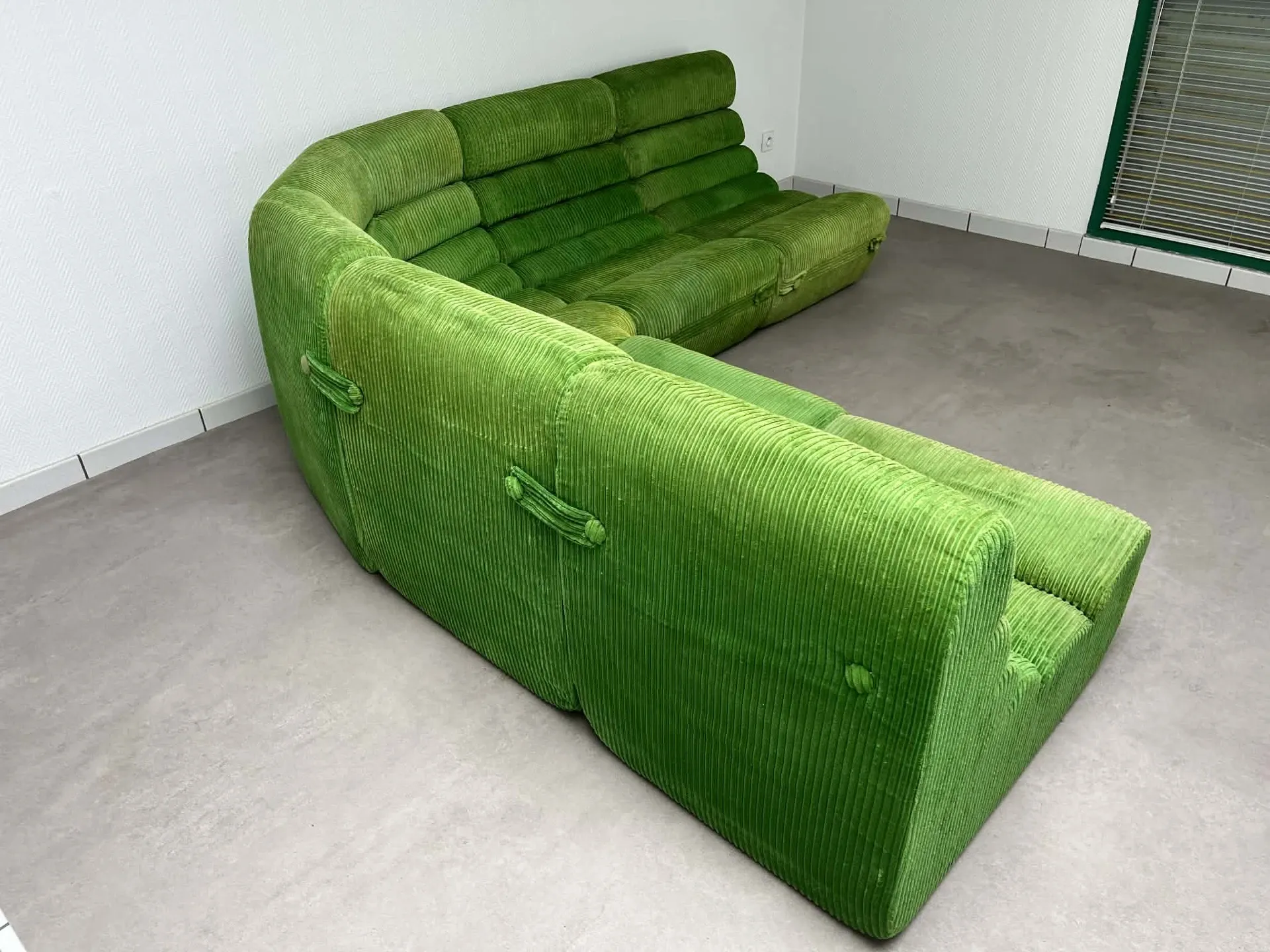 Modular green velvet corner sofa, 1970s