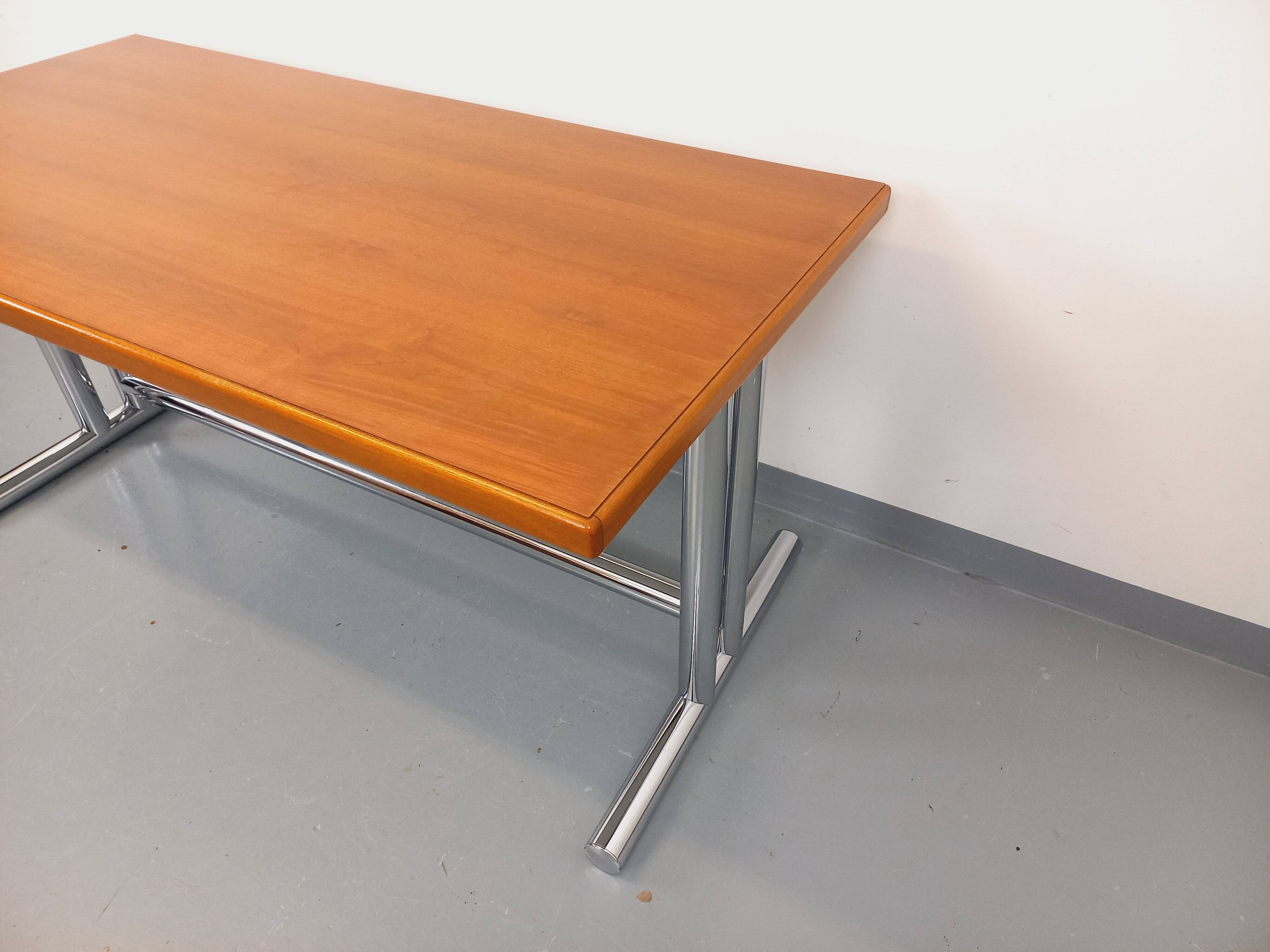 Vintage walnut and chrome metal desk from the 1970s.