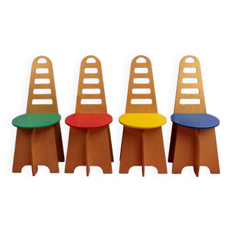 Suite de 4 chaises vintage aux assises colorées