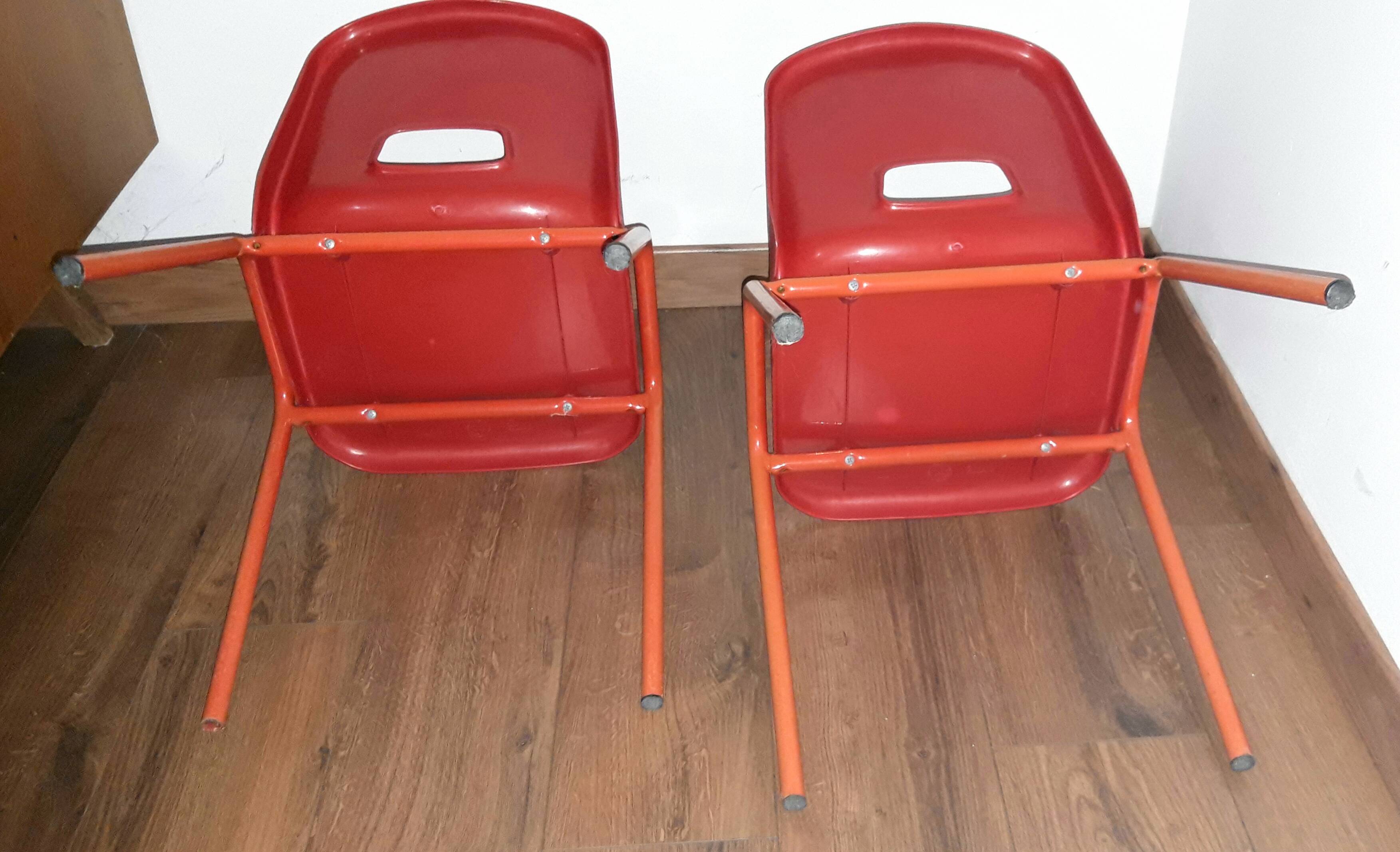 Pair of vintage red chairs