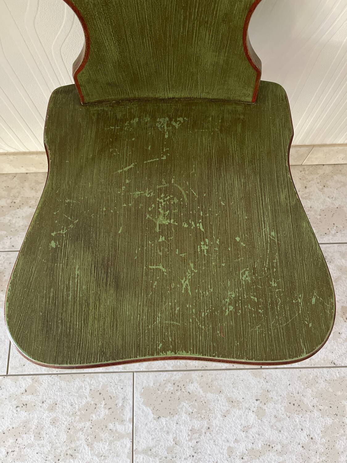 Wooden dressing table with olive green chair and floral patterns