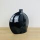 Vintage black ceramic lentil vase