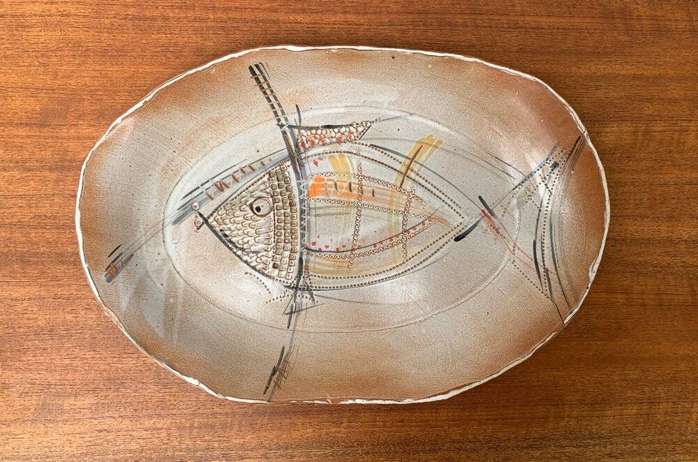 Large German ceramic plate with fish from the mid-century.