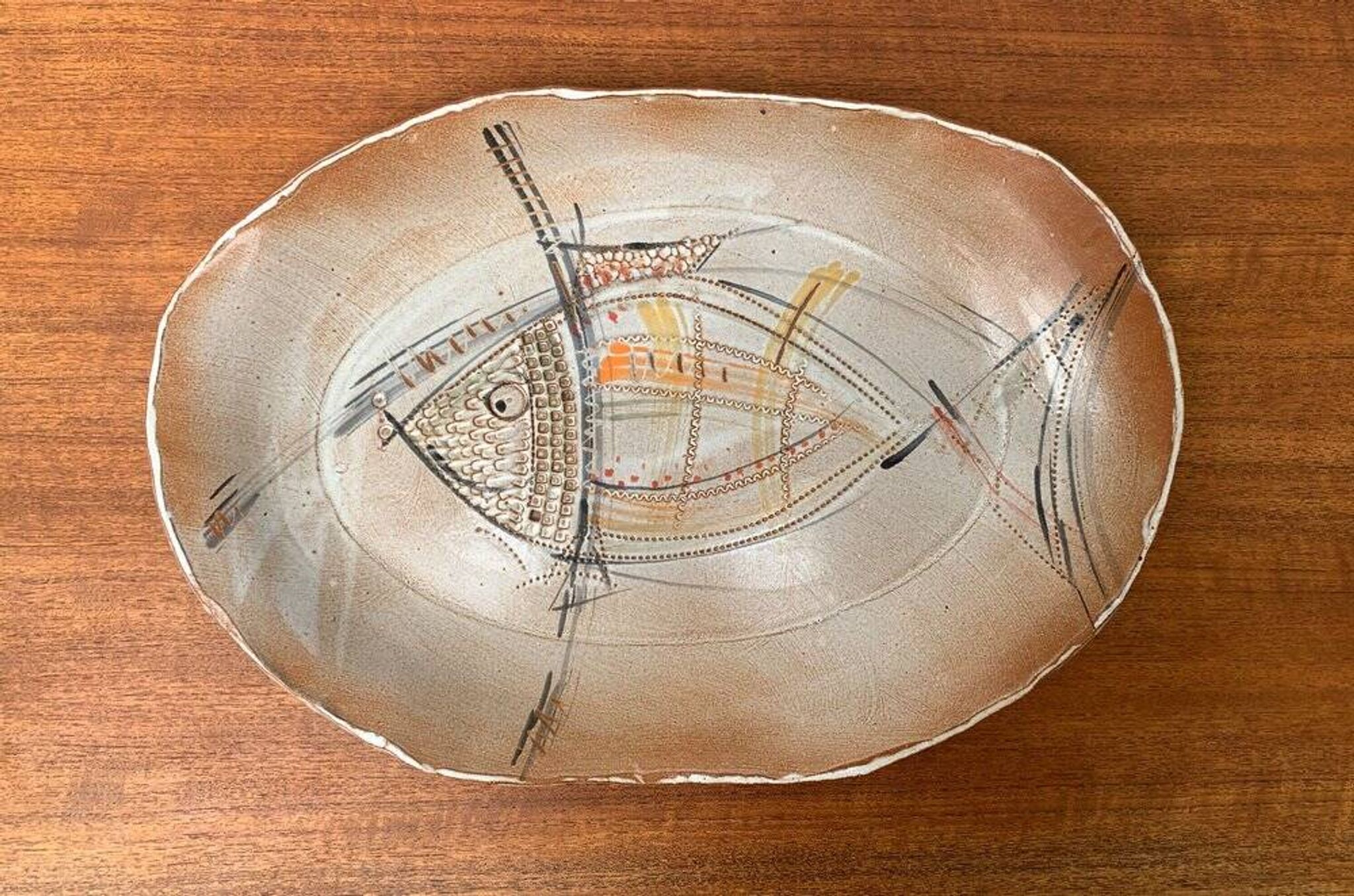 Large German ceramic plate with fish from the mid-century.
