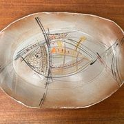 Large German ceramic plate with fish from the mid-century.