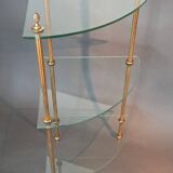 Neoclassical style 3-shelf corner cupboard in gilded brass, Circa 1950/1960.