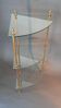 Neoclassical style 3-shelf corner cupboard in gilded brass, Circa 1950/1960.