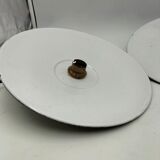 Suspensions in enamelled sheets