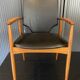 A Scandinavian teak skai chair from the 1960s for a vintage desk table.