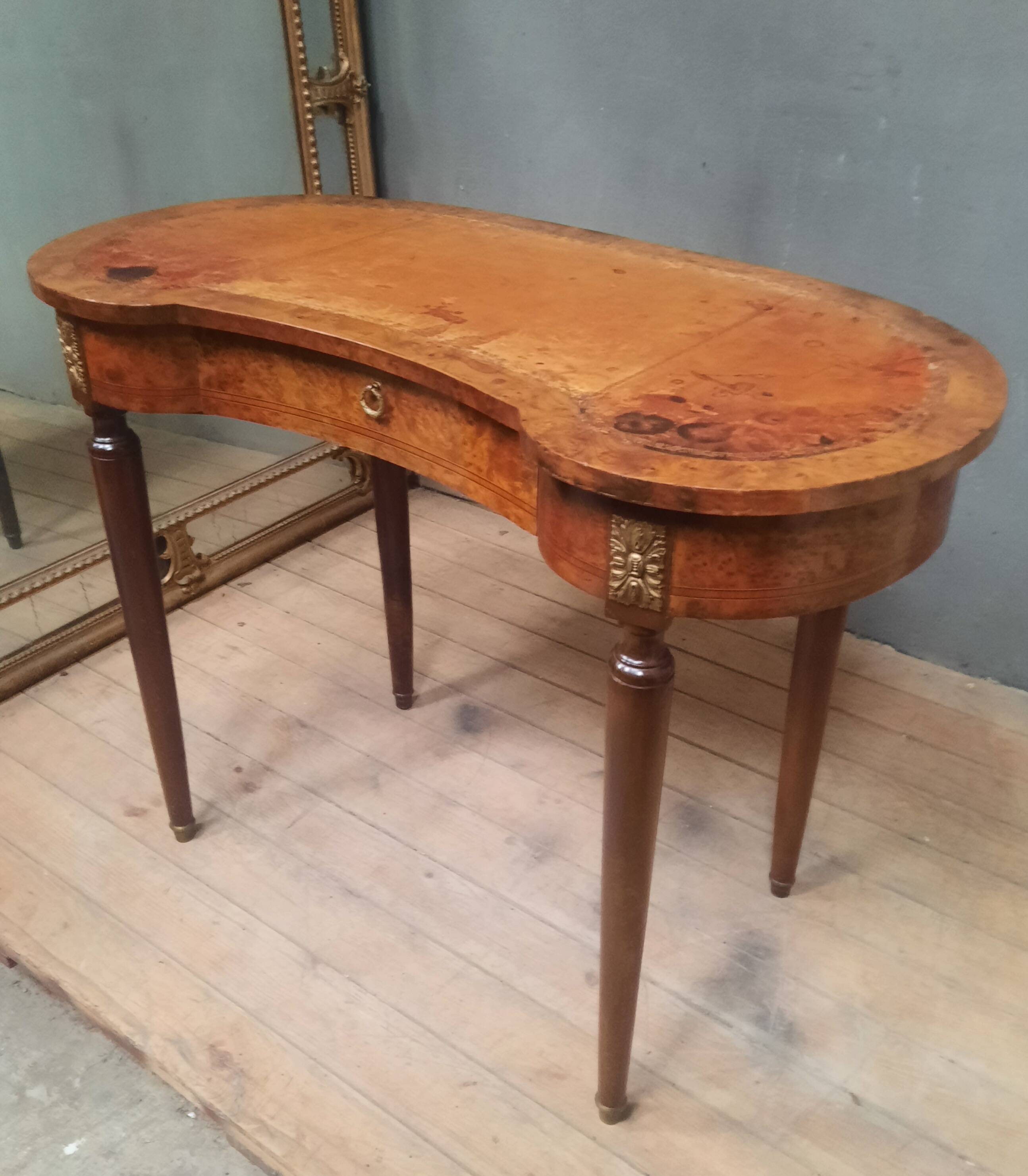 "Kidney" bureau in Louis XVI style veneer.
