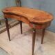 "Kidney" bureau in Louis XVI style veneer.